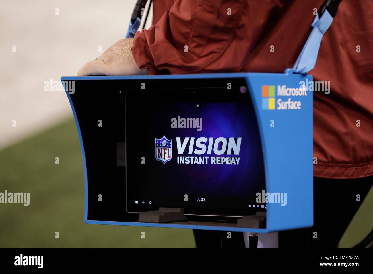 The NFL logo for Instant Replay is visible before an NFL football