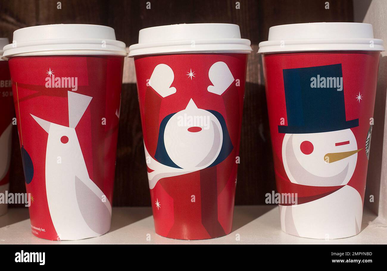 https://c8.alamy.com/comp/2MPYNBD/three-starbucks-holiday-cups-from-the-2012-holiday-season-are-displayed-thursday-nov-9-2017-at-a-starbucks-in-new-york-the-seattle-based-company-is-celebrating-20-years-of-holiday-coffee-cups-ap-photomark-lennihan-2MPYNBD.jpg