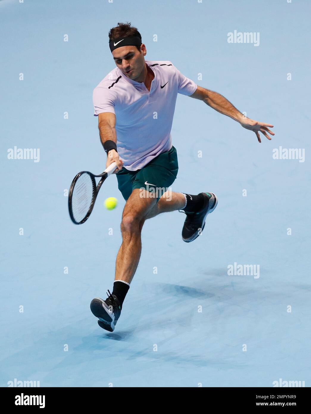 Roger Federer of Switzerland plays a return to Jack Sock of the United  States during their singles tennis match at the ATP World Finals at the O2  Arena in London, Sunday, Nov.