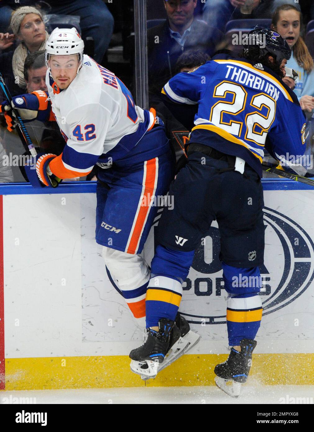 St. Louis Blues' Chris Thorburn (22) Checks New York Islanders' Scott ...