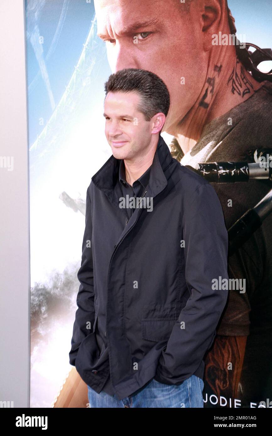 Simon Kinberg at the world premiere of her movie “Elysium” at the