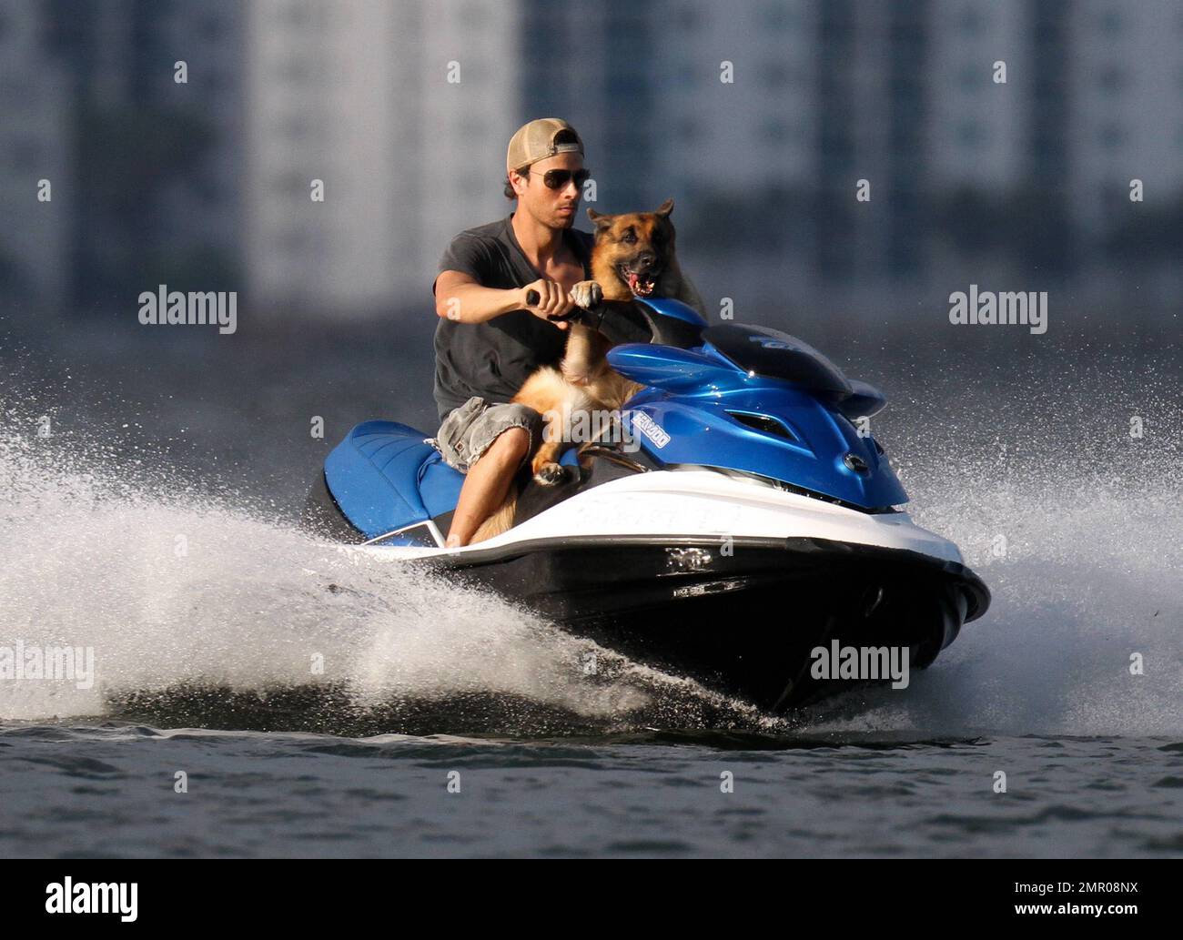 EXCLUSIVE!! Pop music superstar Enrique Iglesias takes to the waves and the  skies with a video crew to film his action-packed lifestyle in Miami.  Iglesias took to the sea in his boat