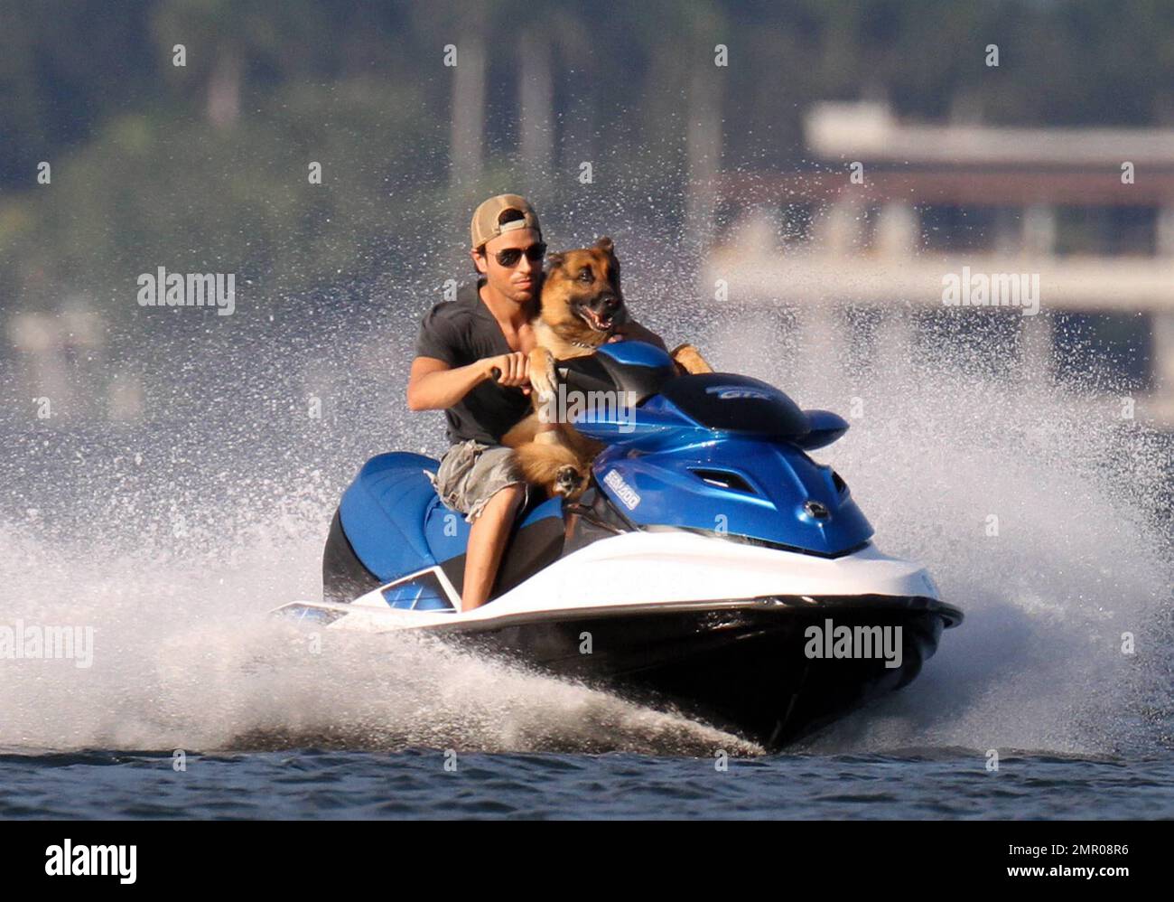 EXCLUSIVE!! Pop music superstar Enrique Iglesias takes to the waves and the  skies with a video crew to film his action-packed lifestyle in Miami.  Iglesias took to the sea in his boat