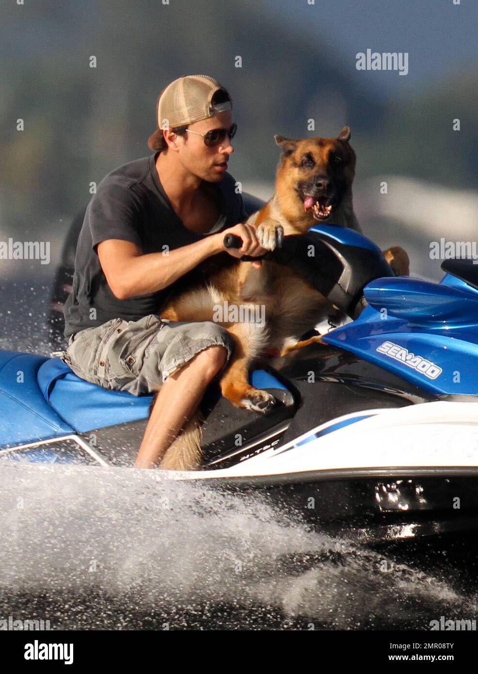 EXCLUSIVE!! Pop music superstar Enrique Iglesias takes to the waves and the  skies with a video crew to film his action-packed lifestyle in Miami.  Iglesias took to the sea in his boat