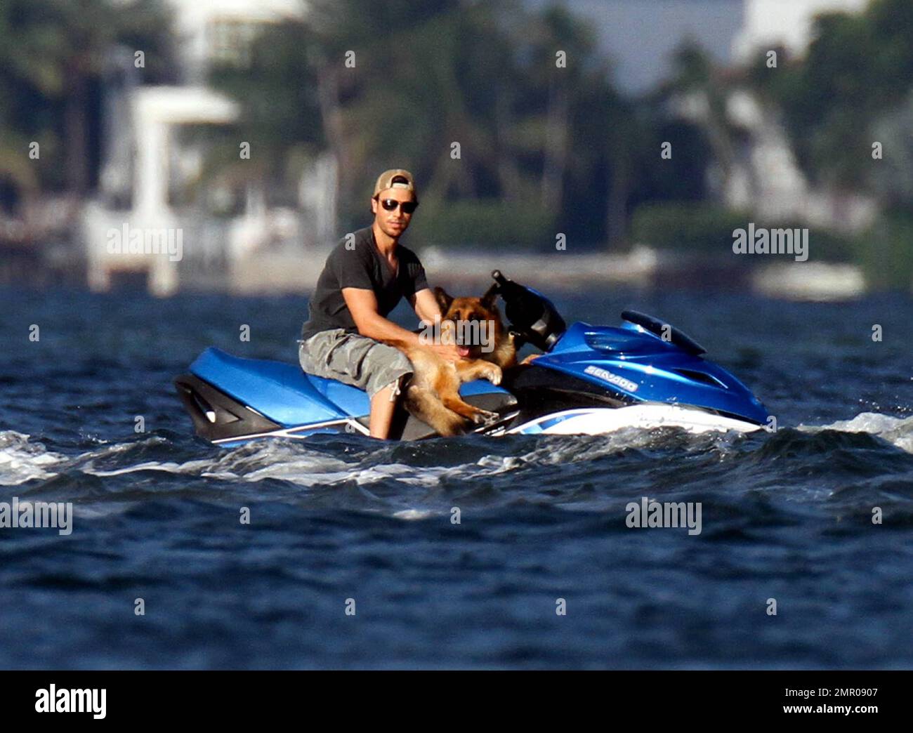 EXCLUSIVE!! Pop music superstar Enrique Iglesias takes to the waves and the  skies with a video crew to film his action-packed lifestyle in Miami.  Iglesias took to the sea in his boat