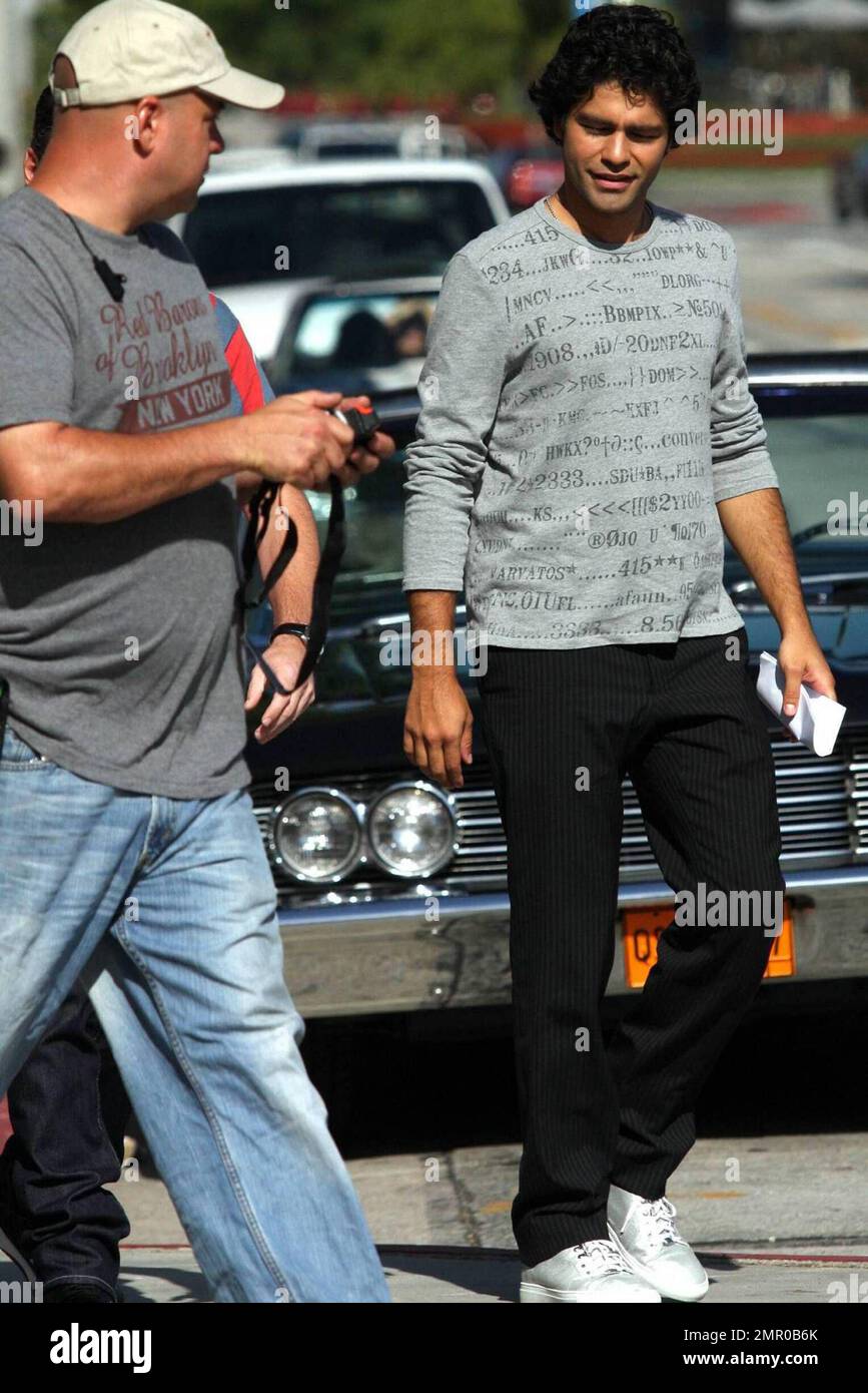 'Entourage' stars Adrian Grenier, Kevin Dillon, Kevin Connolly and Jerry Ferrara film a scene for the hit HBO series at the Urth Caffe in West Hollywood, CA. 6/22/09. Stock Photo