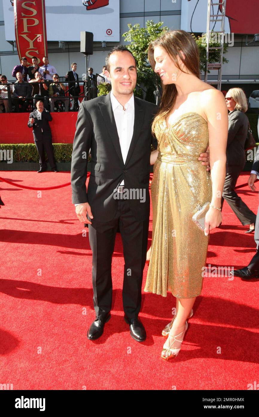 Landon Donovan and Bianca Kajlich walk the red carpet for the 2010 ESPY Awards held at Nokia Theatre L.A. Live on a sizzling hot day. Los Angeles, CA. 07/14/10. Stock Photo