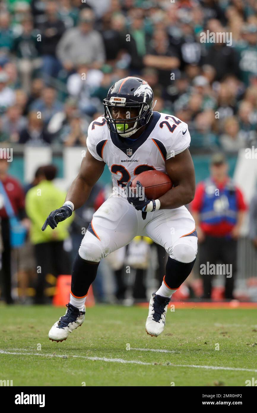 Photo: Denver Broncos C.J. Anderson hugs Head Coach Gary Kubiak