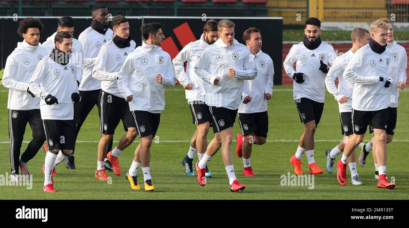 Players jog during a training session of the German national soccer team in Berlin, Germany