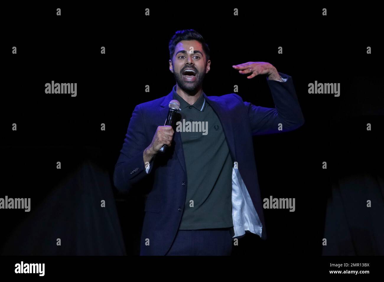 Comedian Hasan Minhaj performs on stage during the 11th Annual Stand Up