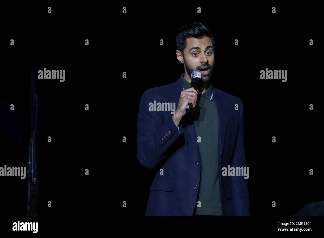 Comedian Hasan Minhaj performs on stage during the 11th Annual Stand Up