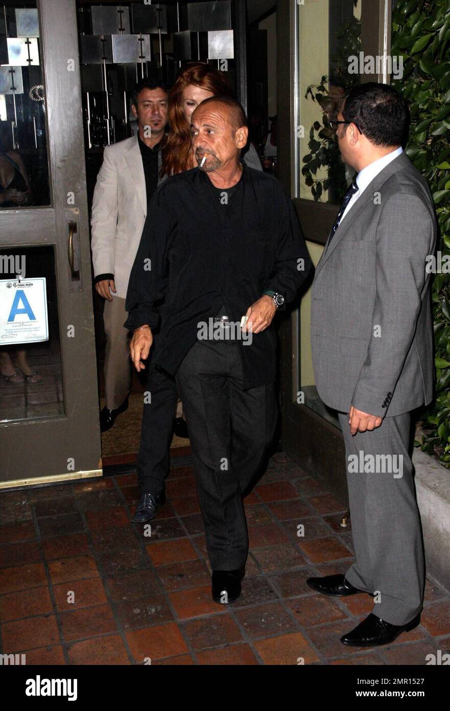 Exclusive!! It looks as if Angie Everhart and Joe Pesci are back together again as they leave the restaurant Ago. Everhart has reportedly accused ex-boyfriend, actor Chad Stansbury, of violently choking her during an incident in August. But, according to the reports, the LA County District Attorney rejected the case after it decided there wasn't enough evidence to prosecute. Angie told the cops that Stansbury choked her during a heated argument and fled the scene. He was then arrested and booked on suspicion of domestic violence. Los Angeles, CA. 10/2/08. Stock Photo