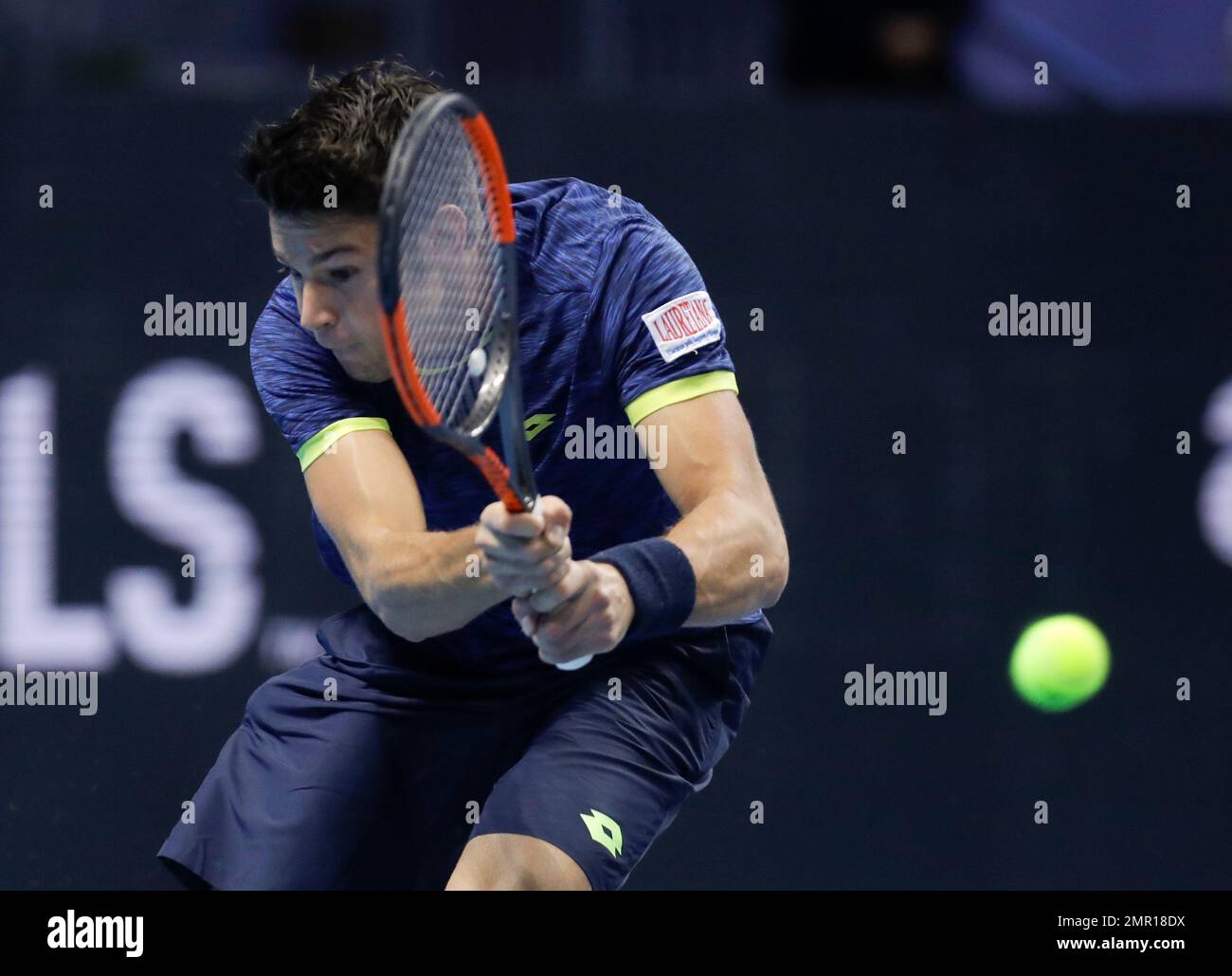 Gianluigi Quinzi of Italy returns the ball to Andrey Rublev of Russia  during the ATP Next Gen tennis tournament finals, at the Rho fair, near  Milan, Italy, Tuesday, Nov. 7, 2017. (AP