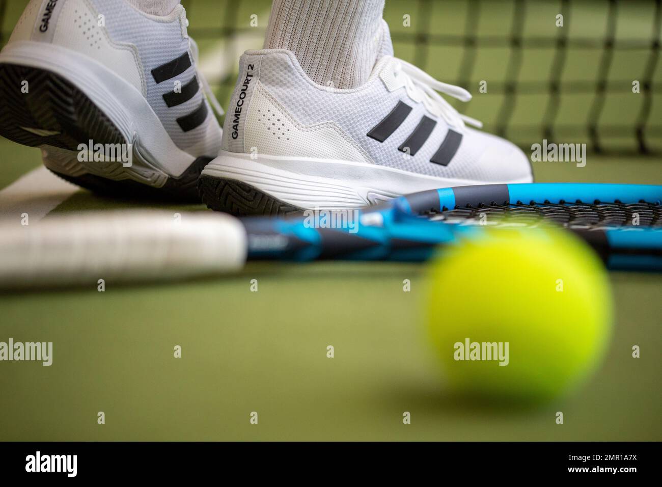 Symbol image Tennis: Close up of a tennis player in the hall Stock Photo
