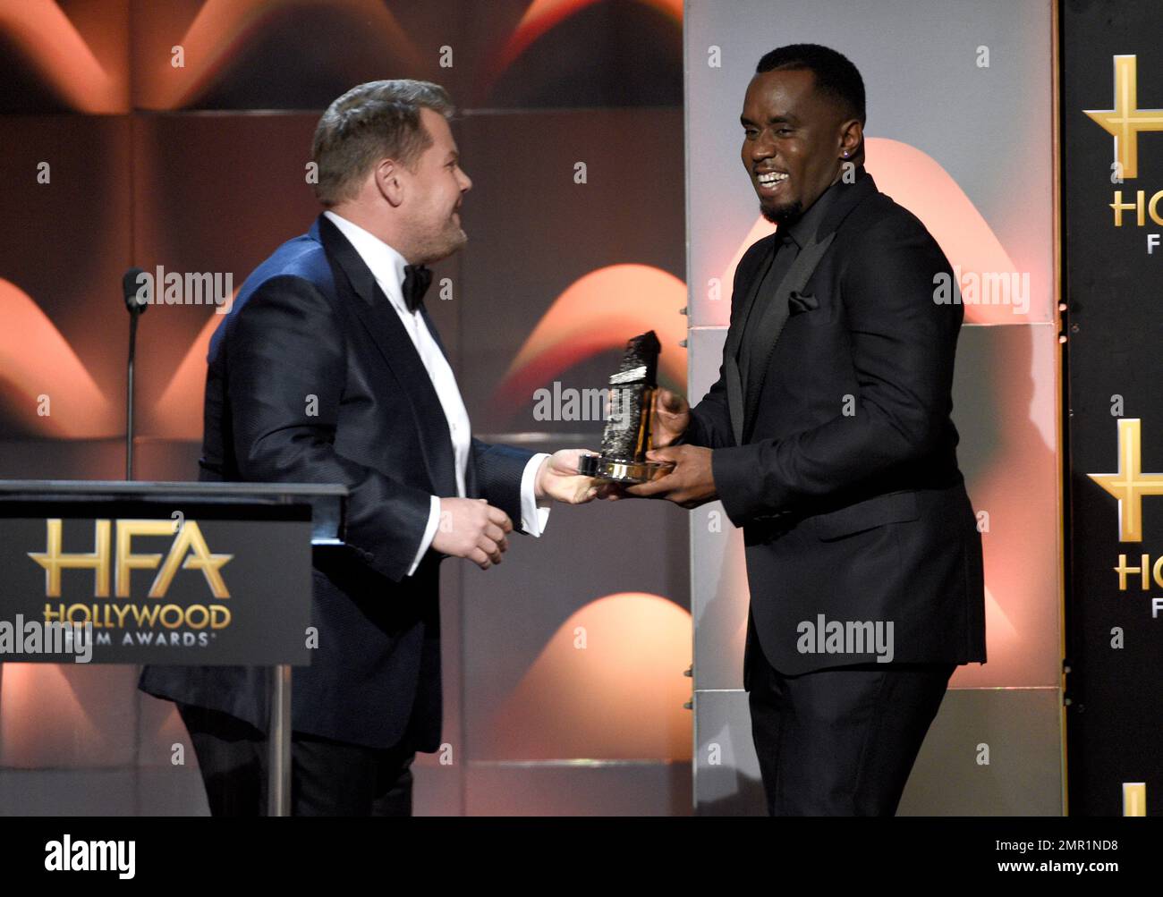 James Corden, left, presents the Hollywood documentary award to Sean