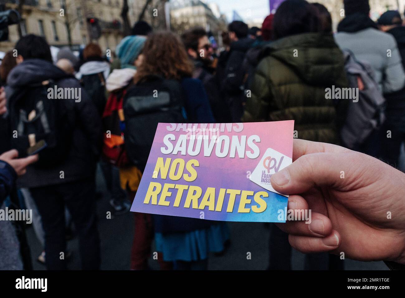 France / Paris, 31/01/2023, Jan Schmidt-Whitley/Le Pictorium -  Strike against pension reform in Paris  -  31/1/2023  -  France / Paris / Paris  -  Sticker 'Save our pensions'. Demonstration against the pension reform in Paris. The trade unions are claiming that this Tuesday's processions will be denser than those formed on 19 January. The police also, according to the figures communicated for mid-day. In Paris, the police prefecture announced 87,000 demonstrators, while the CGT claimed more than 500,000 demonstrators. Stock Photo