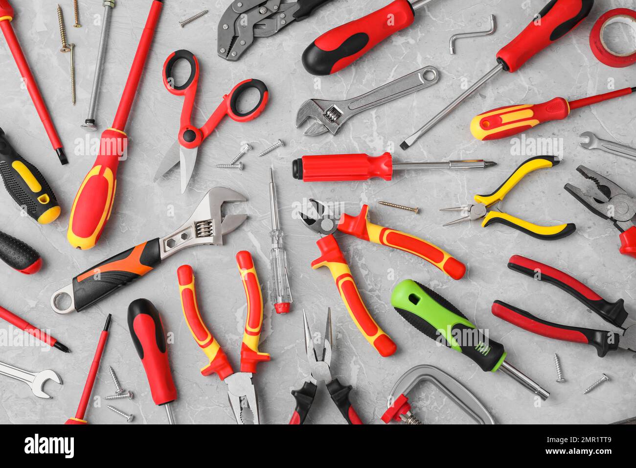 Flat lay composition with different construction tools on marble ...