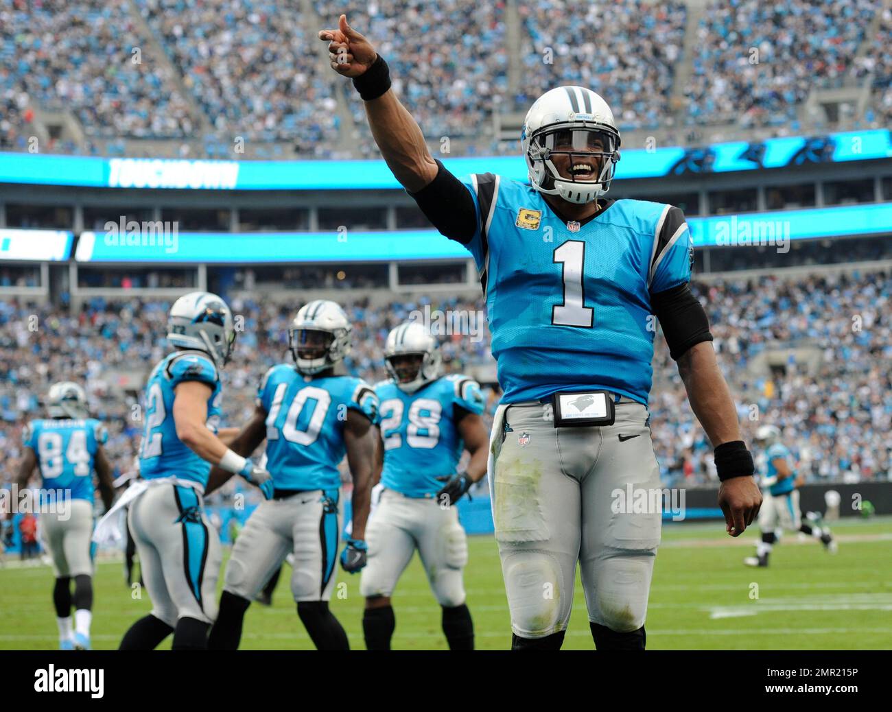 Carolina Panthers' Cam Newton (1) celebrates with Carolina