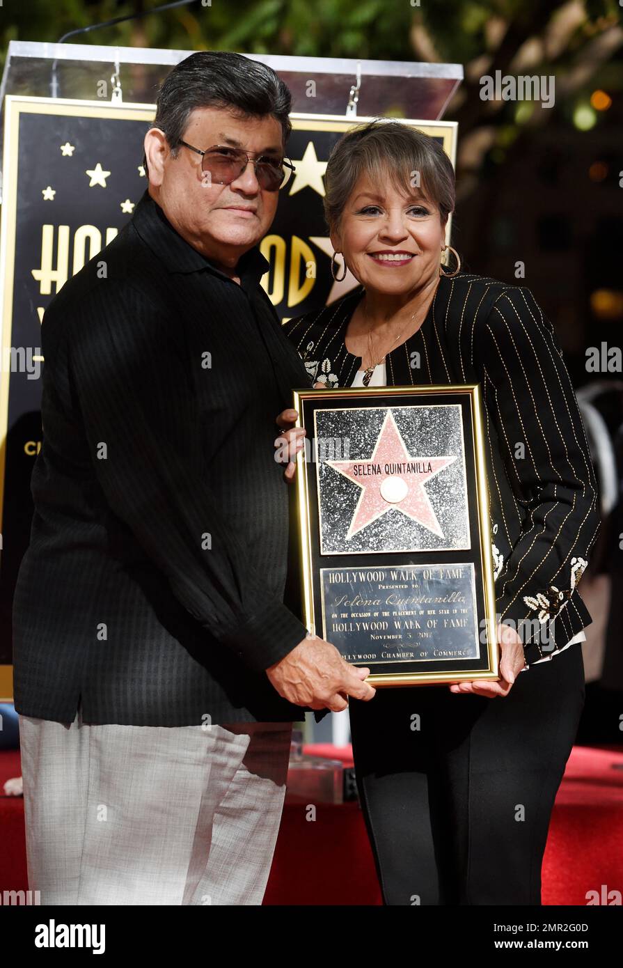 Abraham Quintanilla Jr., left, and Marcella Ofelia Samora, parents of