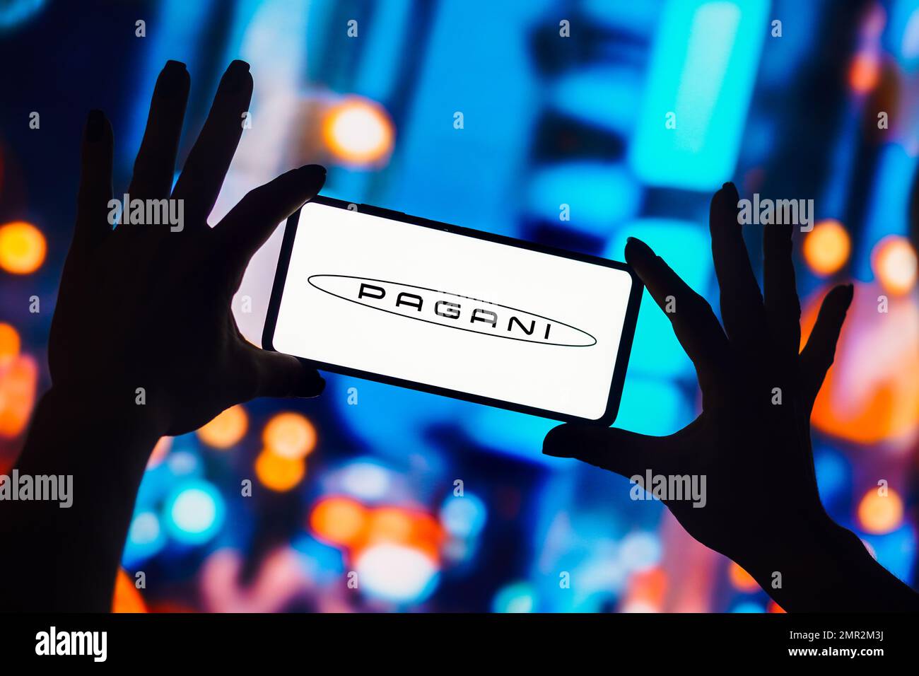 In this photo illustration, the Pagani Automobili logo is displayed on a smartphone screen Stock