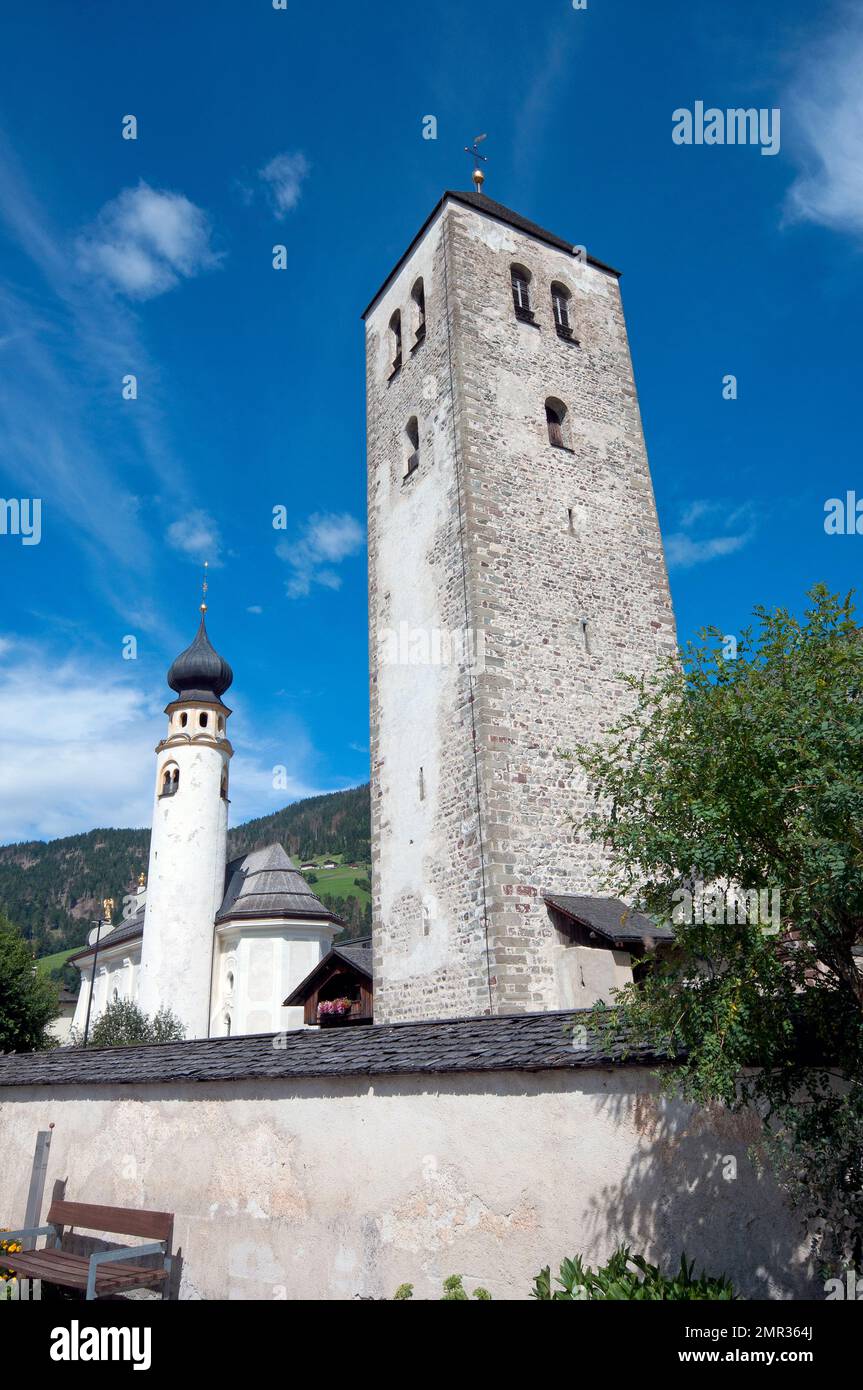 Collegiate church and on the left San Michael church with cylindrical bell tower, San Candido (Innichen), Pusteria Valley, Trentino-Alto Adige, Italy Stock Photo