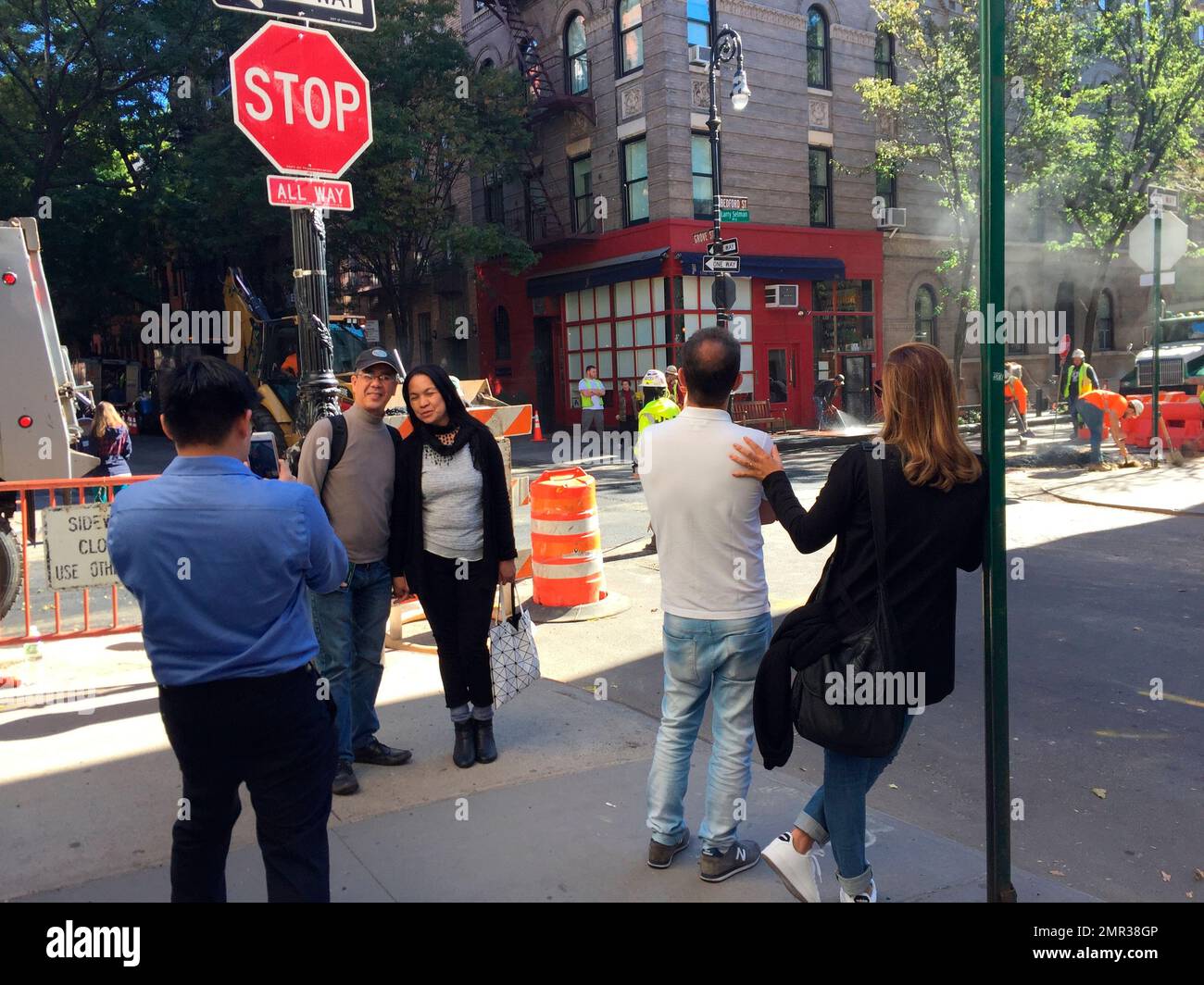 This Oct. 20, 2017 photo shows people posing for photos at the corner