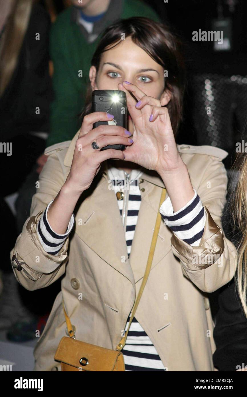 Alexa Chung sits front row at the Topshop Unique fashion show during London  Fashion Week. London, UK. 02/20/11 Stock Photo - Alamy