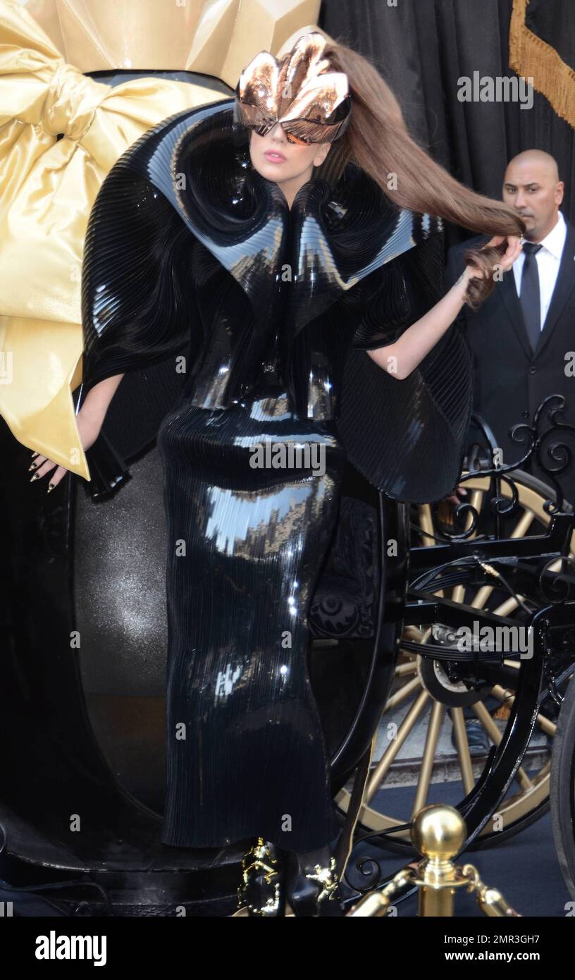 Lady Gaga promotes her new fragrance, Fame, at Macy's. Gaga arrived in a  horse-drawn carriage depicting the egg-shaped perfume bottle and wore a  futuristic black dress paired with high heels featuring gold