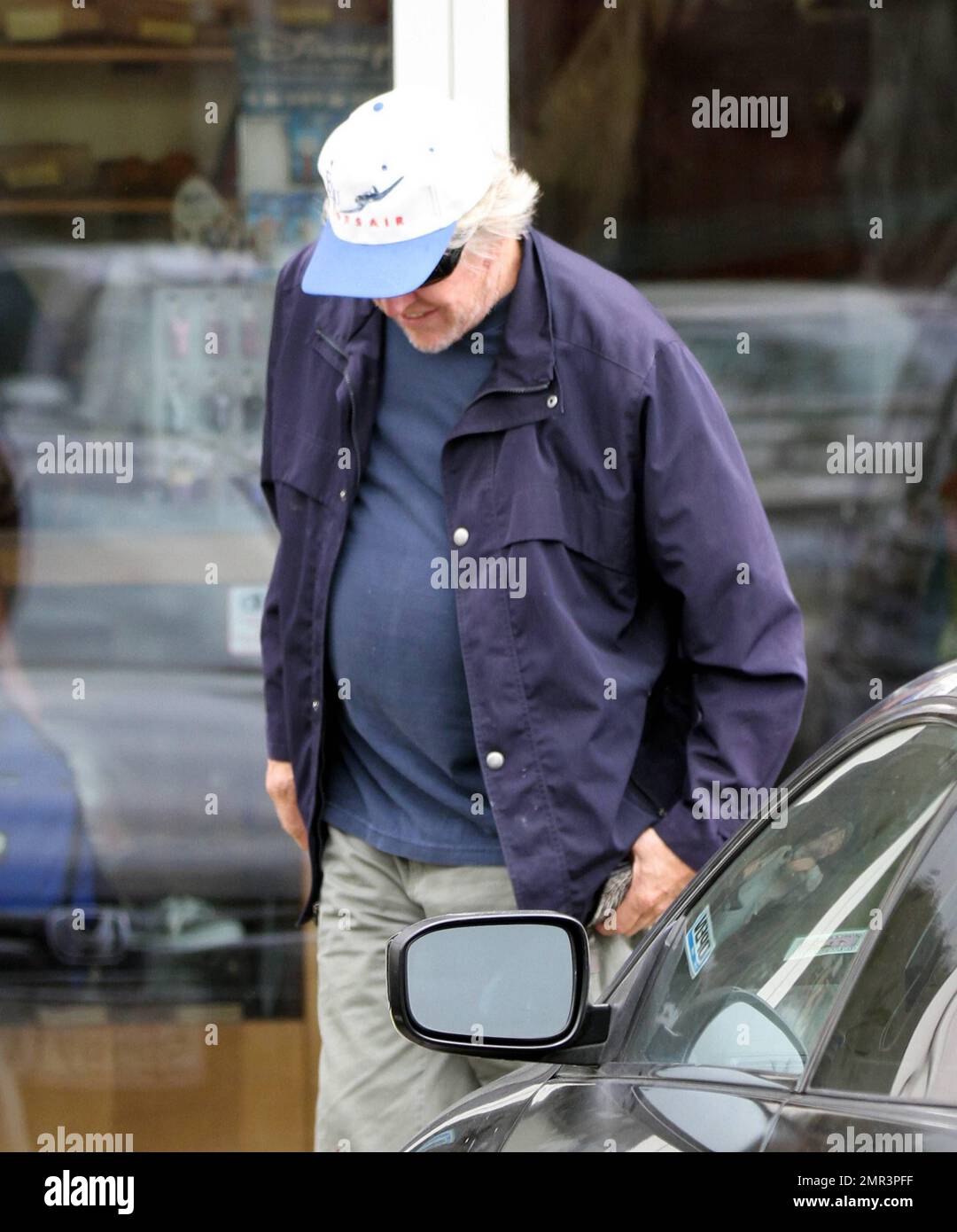 EXCLUSIVE!! Gary Busey takes a well worn pair of moccasins to the shoe repair shop. Busey, 67, who filed for chapter 7 bankruptcy Feb. 7 claimed $500,000 in debts and $26,225 in assets, including old moccasins, two teepees, a broken pellet gun, an old bull's head and 300 VHS tapes. Presumably, the actor was repairing the moccasins mentioned in the list. Busey reportedly recently passed an online financial management course required by the U.S. Bankruptcy Court with top marks. Malibu, CA. 31st March 2012. Stock Photo