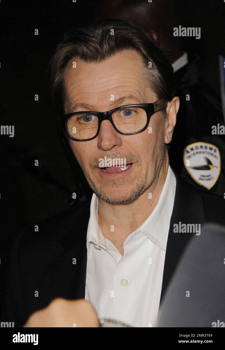 Recent Oscar nominee Gary Oldman signs autographs for fans outside the "Jimmy Kimmel Live