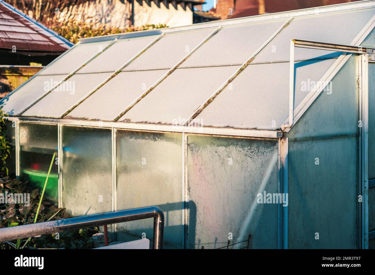 Greenhouse Or Glass House After A Night Of Frost In The Morning 