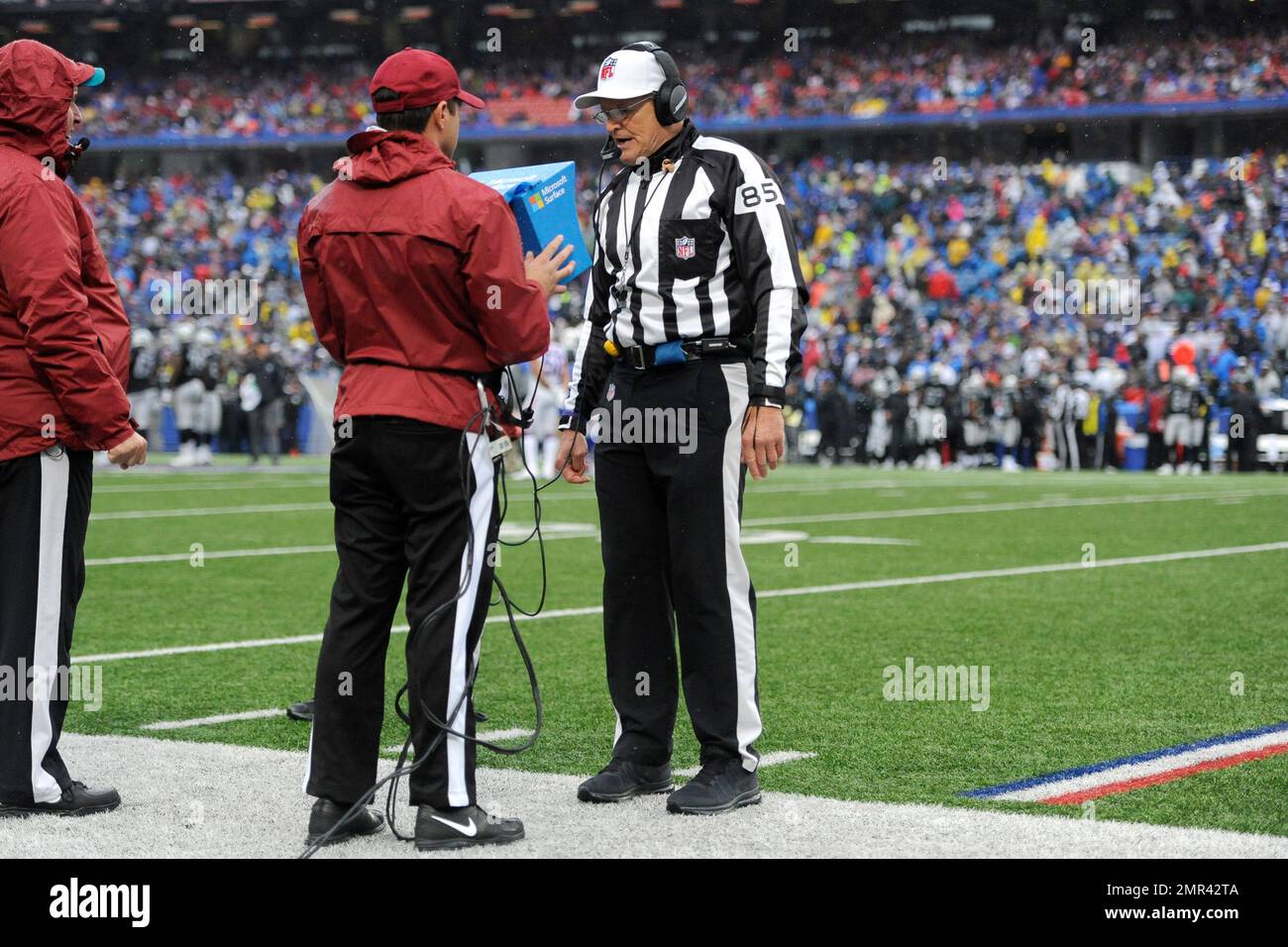 NFL referee Ed Hochuli (85) look over a replay during an NFL football game  between the Atlanta Falcons and the Dallas Cowboys, Sunday, November 12,  2017, in Atlanta. The Falcons won 27-7. (