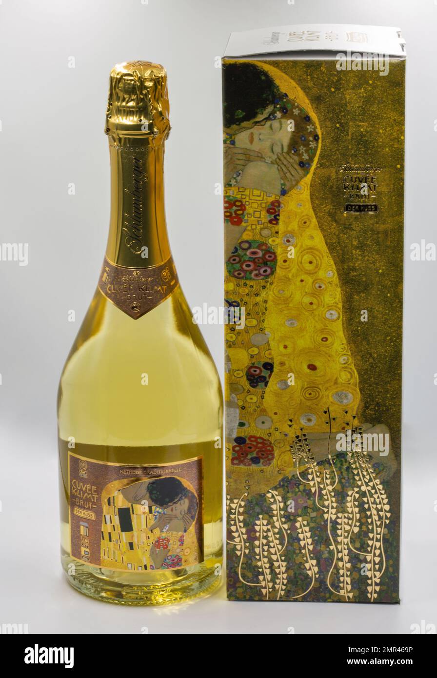 Kyiv, Ukraine - April 29 2022: Schlumberger Cuvee Klimt brut sparkling wine bottle and box closeup on white. On the label famous picture The Kiss by A Stock Photo