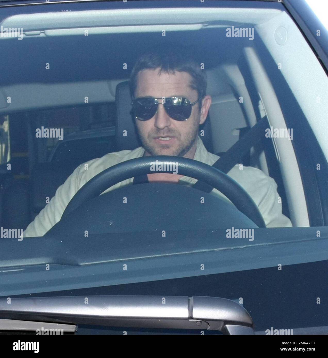 Gerard Butler was spotted out and about driving his Range Rover