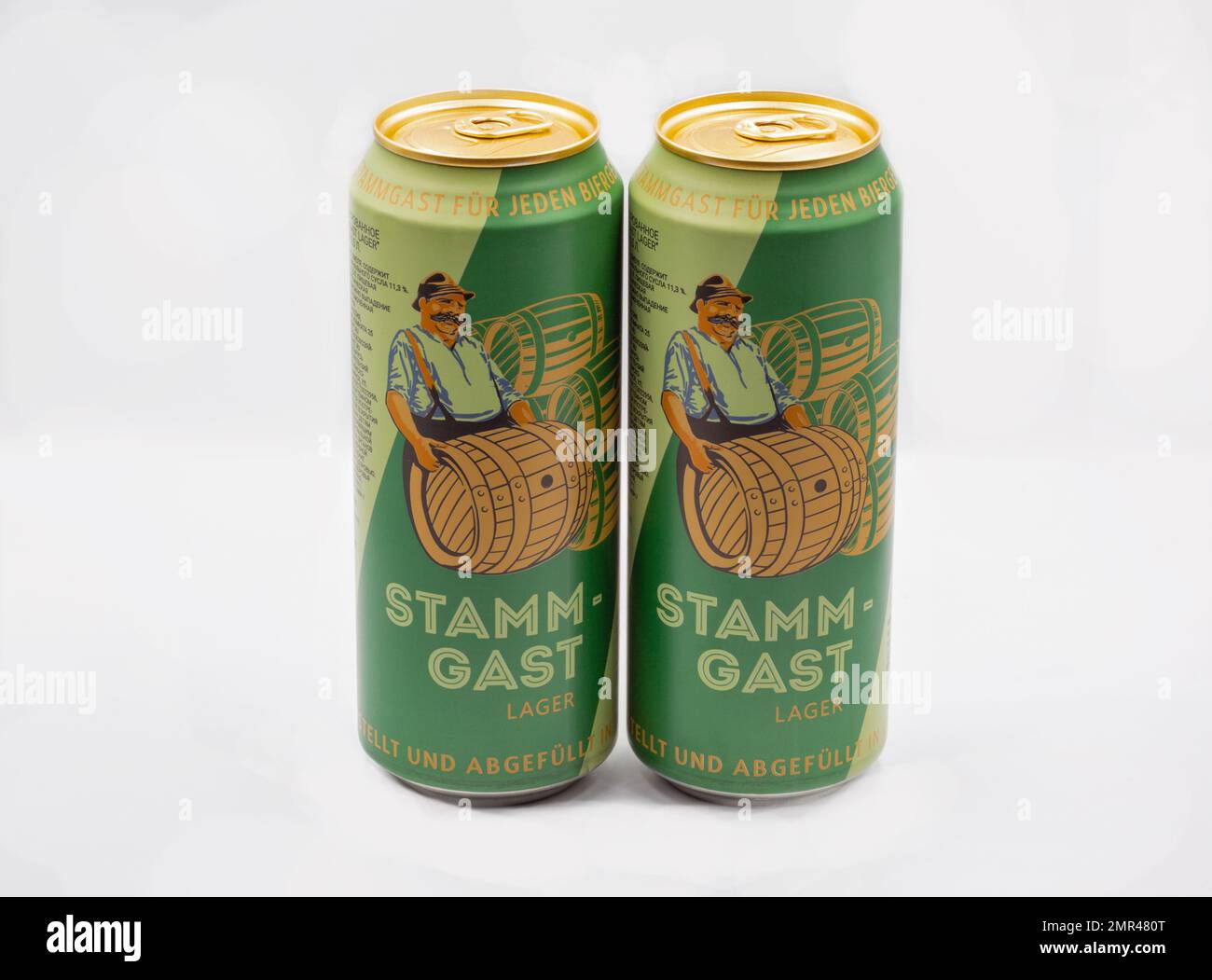 Kyiv, Ukraine - June 18, 2022: Studio shoot of German Stamm-Gast lager beer cans closeup on white. Stock Photo