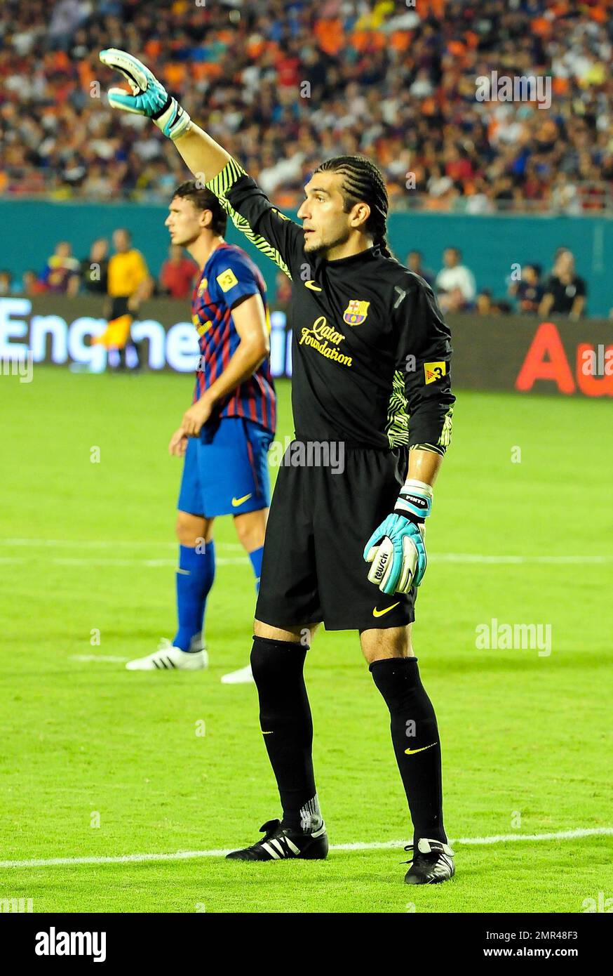 Shakira's boyfriend Gerard Pique (#3) plays with FC Barcelona in its match with CD Guadalajara during the Herbalife World Football Challenge match at Sun Life Stadium in Miami, FL. 3rd August 2011. Stock Photo
