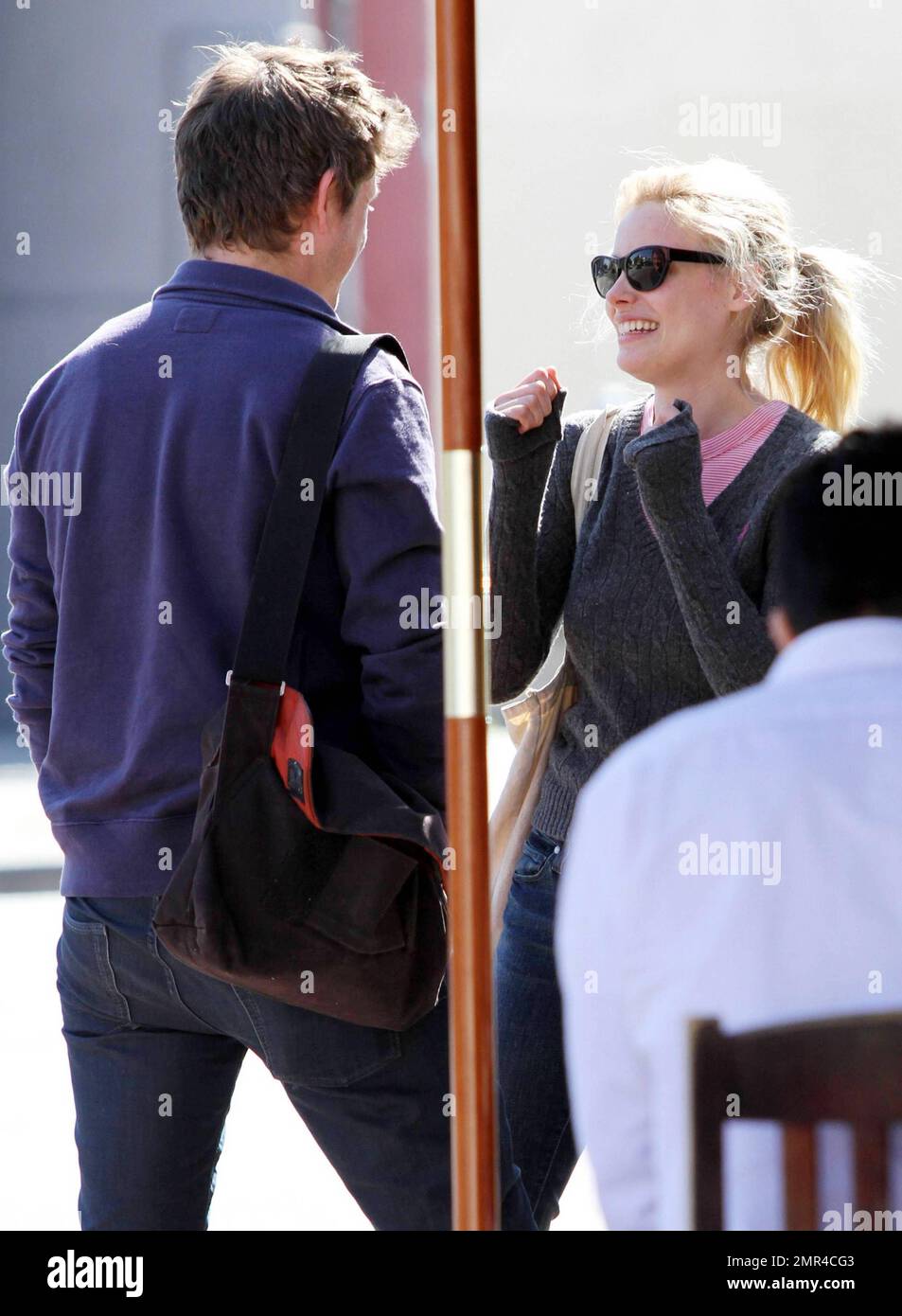 EXCLUSIVE!! Actress Gillian Jacobs looks very happy as she leaves the Kings  Road Cafe with a male companion and later texts on her cellphone. Los  Angeles, CA. 04/10/11 Stock Photo - Alamy