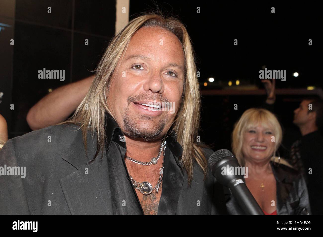 'Motley Crue's' front man Vince Neil and girlfriend Rain Andreani make