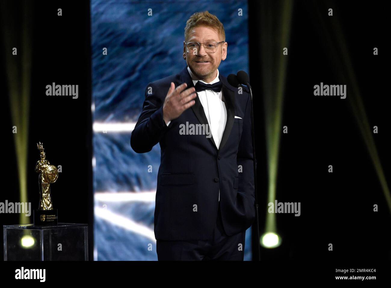 Kenneth Branagh accepts the Albert R. Broccoli award for worldwide ...