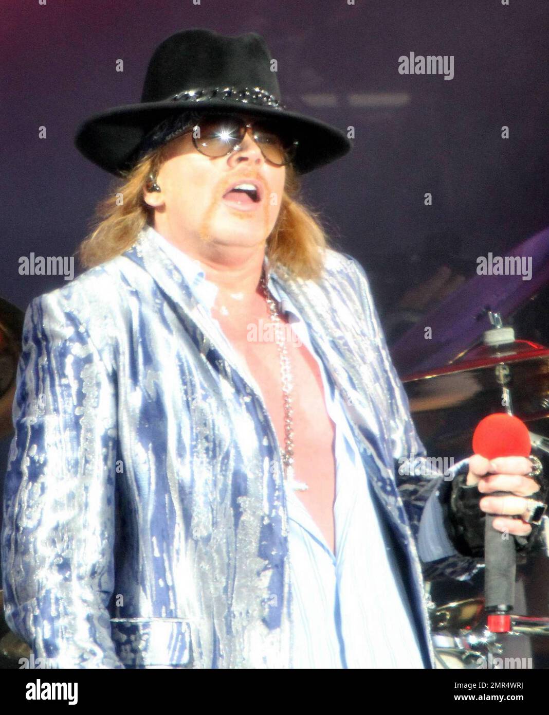 Guns N' Roses performs live in concert, headlining the main stage at ...
