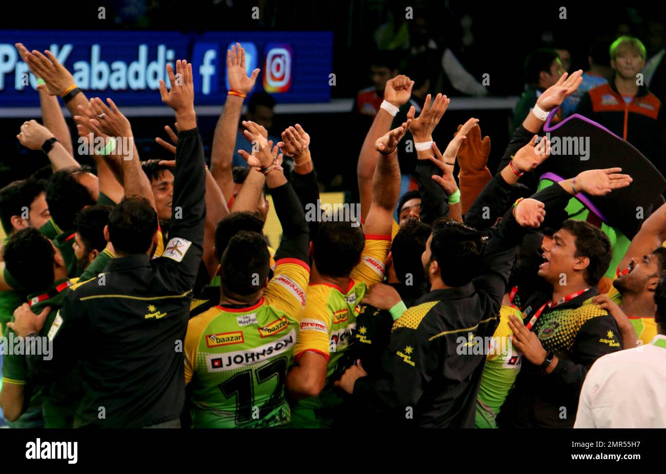 Patna Pirates in green jersey celebrate after winning the match against the Bengal  Warriors to qualify for the finals of Vivo Pro Kabaddi league in Chennai,  India, Thursday, Oct.26, 2017. (AP Photo