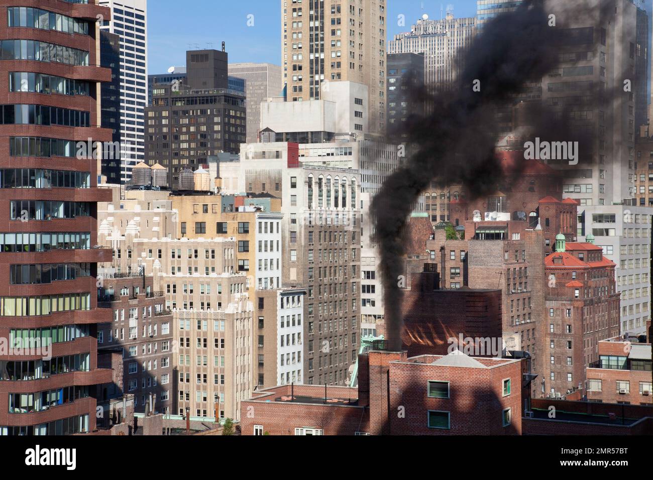 Black Smoke Polluting Air, NYC, 2011 Stock Photo