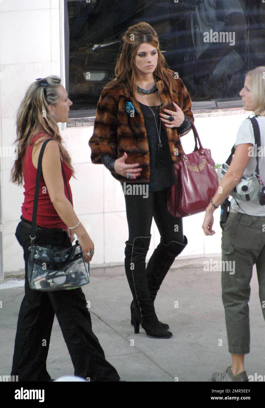 EXCLUSIVE!! Ashley Greene dons thigh high suede boots and a fur coat for  scenes in her latest movie LOL with Miley Cyrus. The actress is reportedly  dating Joe Jonas. Detroit, MI. 8/26/10