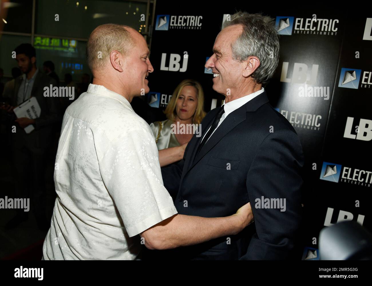 Woody Harrelson, left, star of "LBJ," embraces Robert F. Kennedy Jr. at the premiere of the film