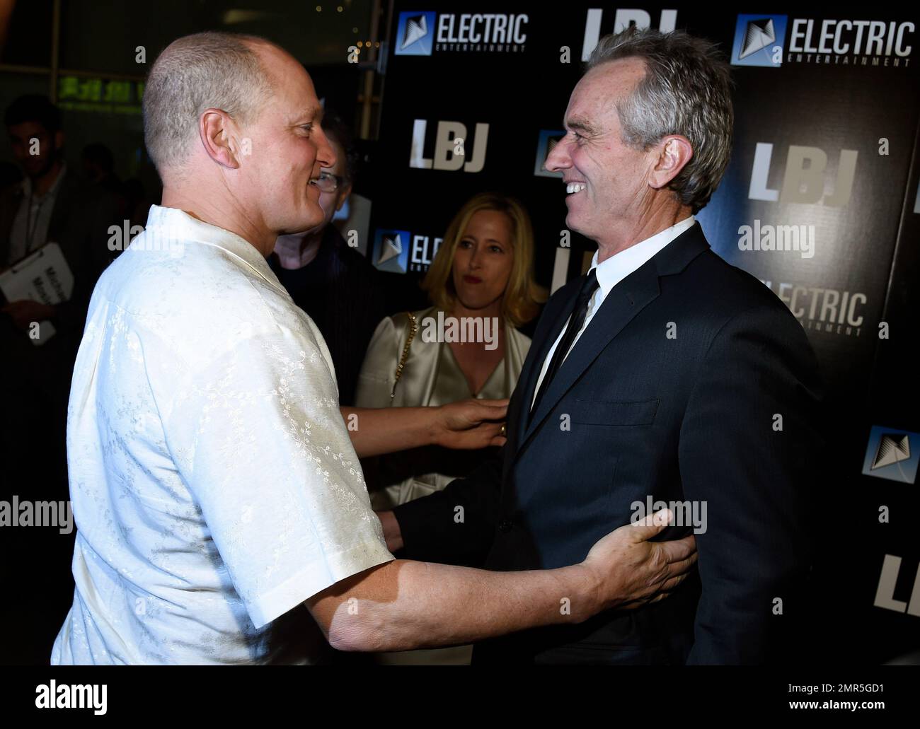 Woody Harrelson, left, the star of "LBJ," greets Robert F. Kennedy Jr. on the red carpet at the
