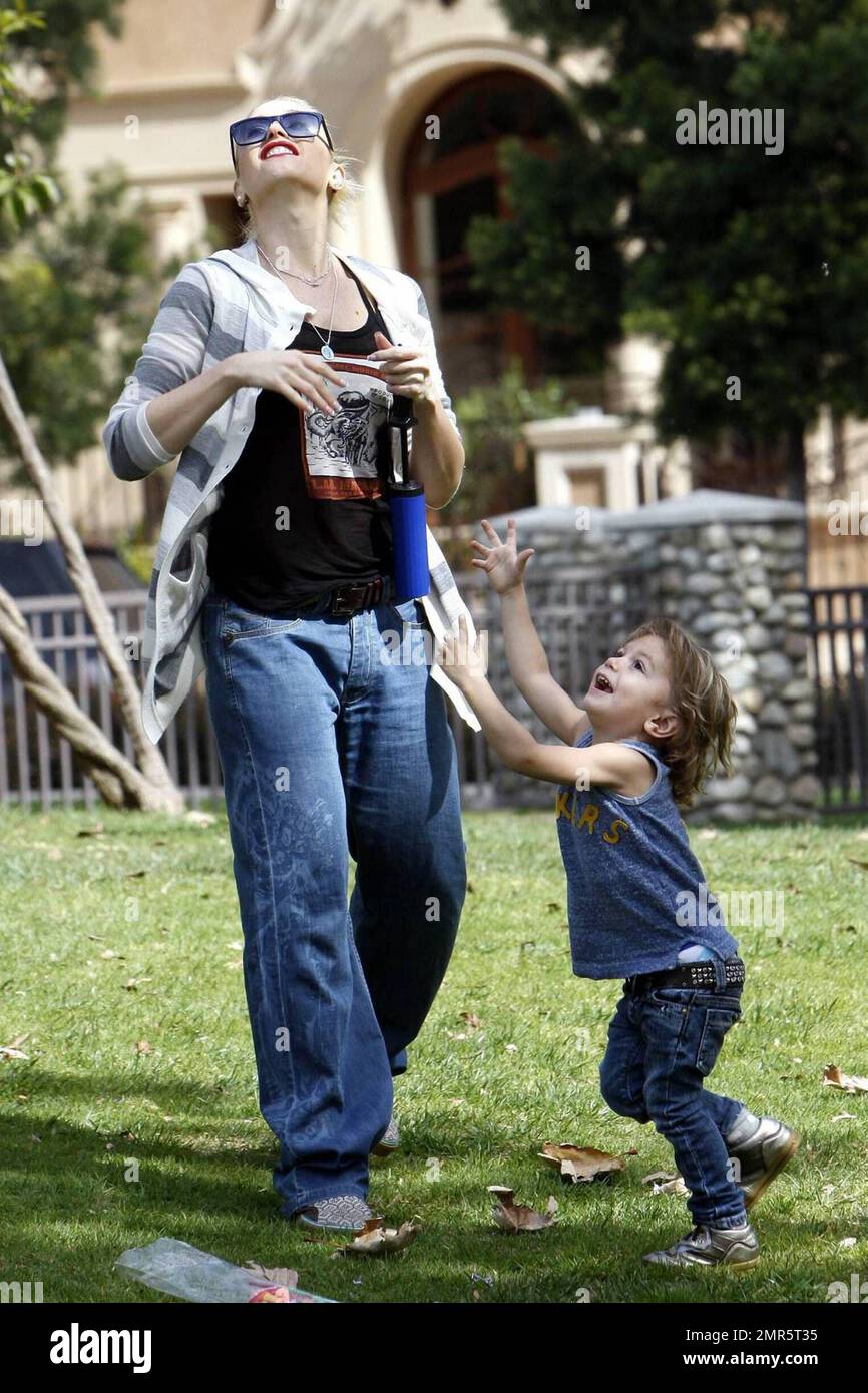 Gwen Stefani and son Kingston have fun blowing up balloons in a Beverly