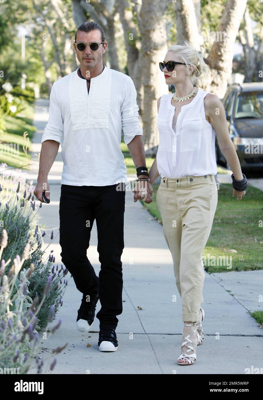 Gwen Stefani and rocker husband Gavin Rossdale get in to the Halloween  spirit by taking their adorable sons Kingston and Zuma, dressed as  vampires, out to a pumpkin patch in L.A. The, image size:914x1390