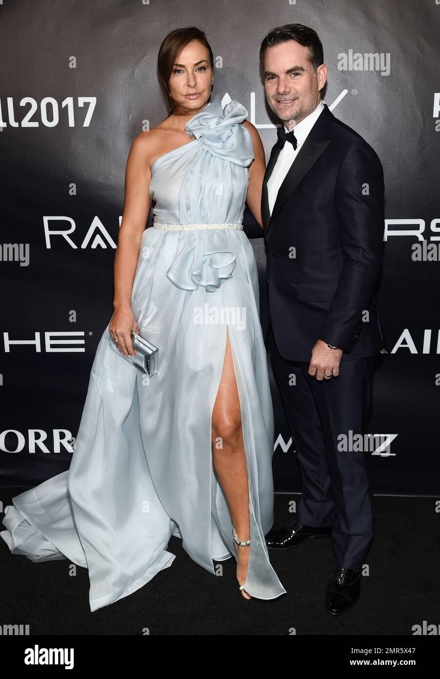 American race car driver Jeff Gordon and wife Ingrid Vandebosch attend