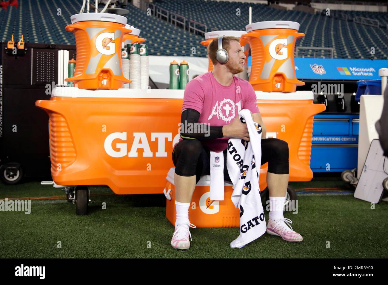 Philadelphia Eagles quarterback Carson Wentz sits on a cooler after working  out prior to an NFL football game against the Washington Redskins, Monday,  Oct. 23, 2017, in Philadelphia. (AP Photo/Michael Perez Stock