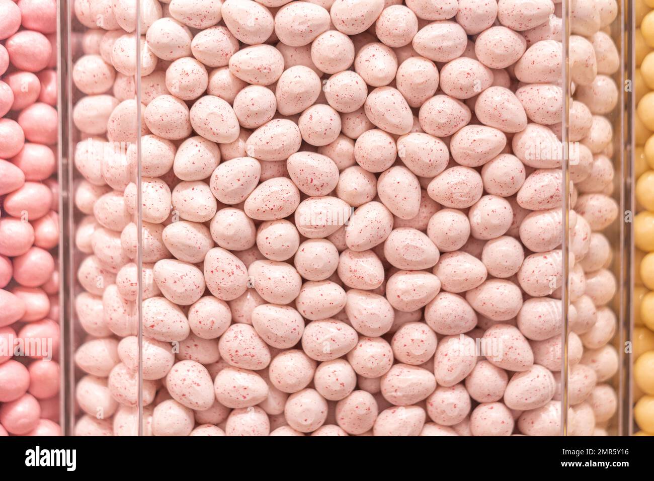 Pastel pink candies in a shop window Stock Photo Alamy